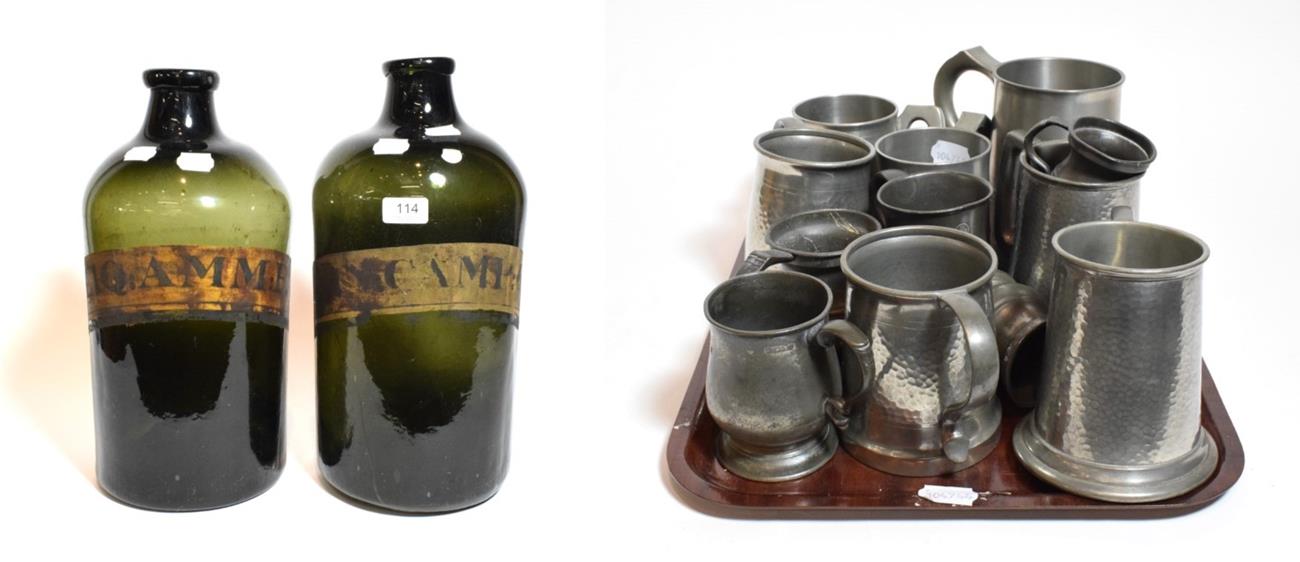 Lot 114 - Pair of 19th century green glass apothecary bottles; together with a collection of pewter tankards