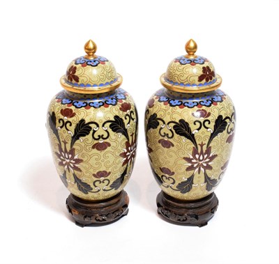 Lot 120 - A pair of 20th century Chinese cloisonne jars and covers, floral design with modern wooden...
