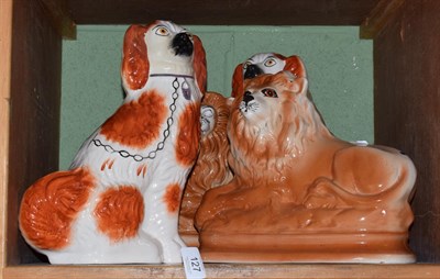 Lot 127 - Two Staffordshire dogs and two Staffordshire lions (4)