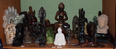 Lot 130 - A quantity of modern decorative Asian and African figures, Buddha's etc; including a pressed...