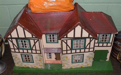 Lot 140 - A 20th century doll's house with miscellaneous contents; together with a collection of...