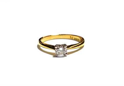 Lot 175 - An 18 carat gold diamond solitaire ring, a round brilliant cut diamond in a white claw setting,...