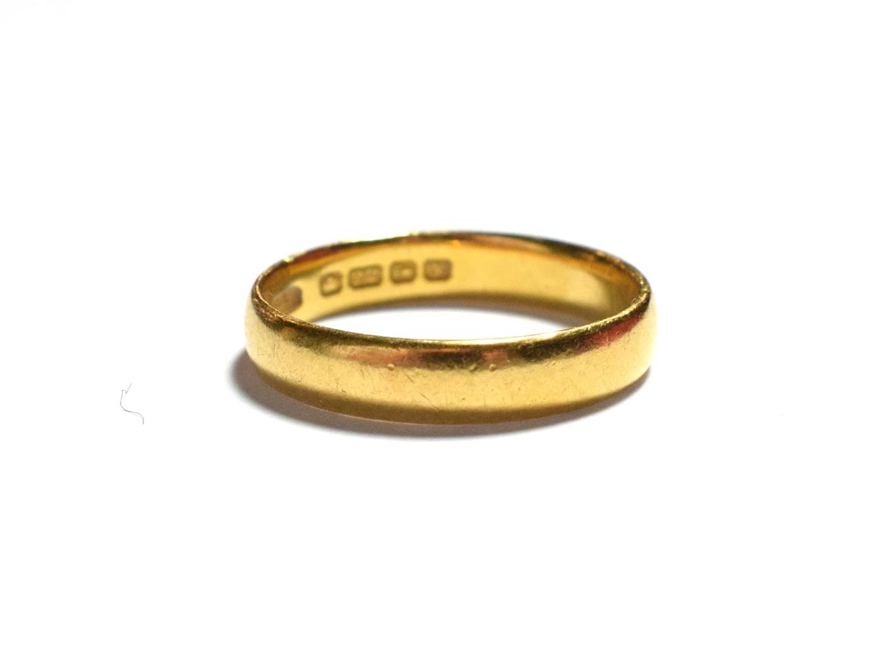 Lot 177 - A 22 carat gold band ring, finger size O