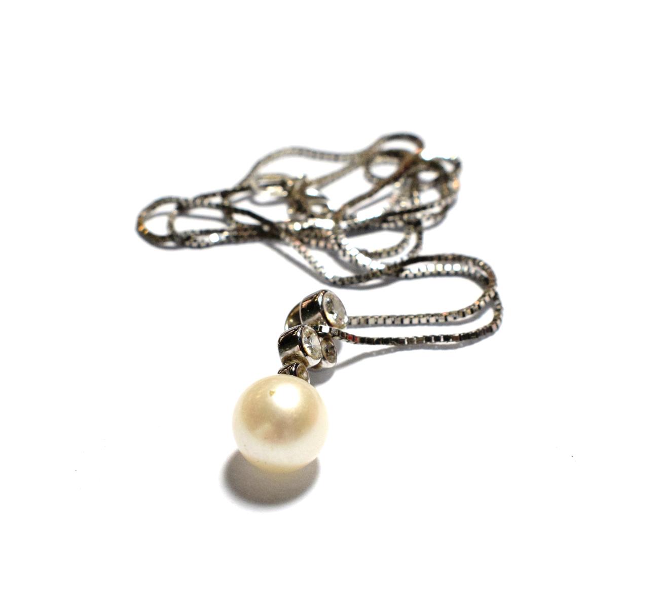 Lot 181 - A cultured pearl and diamond set pendant on chain, pendant length 2.2cm, chain length 40cm