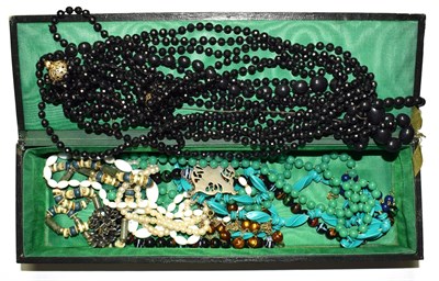 Lot 214 - A quantity of costume jewellery including beaded necklaces, wristwatches, brooches etc