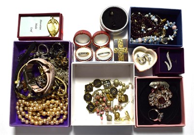 Lot 215 - A quantity of costume jewellery including earrings, rings, necklaces, wristwatches, beaded...