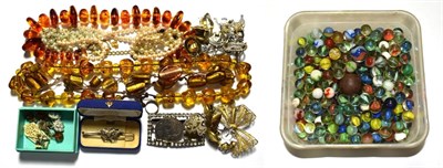 Lot 216 - A quantity of jewellery including amber type necklaces, silver jewellery etc; and a box of marbles