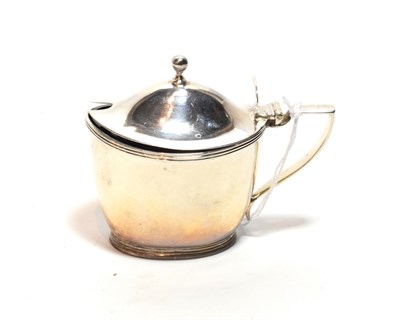 Lot 217 - A George III silver mustard-pot, by John Emes, London, 1802, tapering oval and with reeded...
