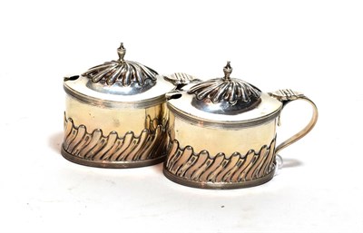 Lot 219 - A pair of Victorian silver mustard-pots, by Samuel Walton Smith, Birmingham, 1894, each oval...
