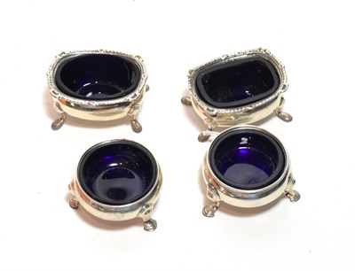 Lot 240 - A pair of George II silver salt-cellars, London, 1750, each bombe and on pad feet, with blue...