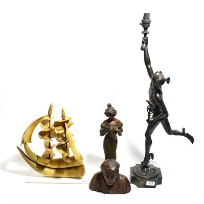 Lot 273 - A bronze model of Mercury fitted as a light, together with a spelter model of a lady, a carved...