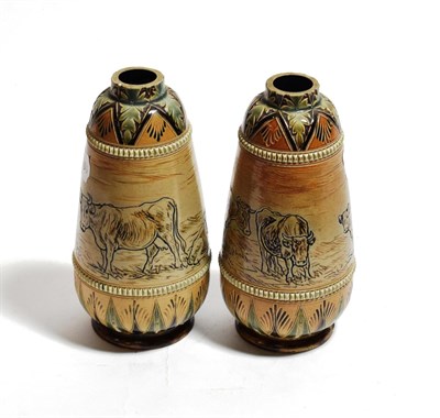Lot 295 - A pair of Royal Doulton vases by Hannah Barlow, cow decoration, 18.5cm high (a.f.)