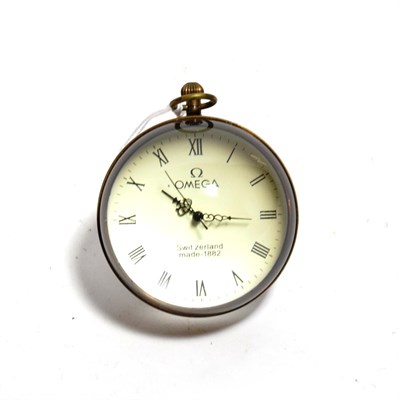 Lot 302 - A bullseye desk clock with faux Omega dial