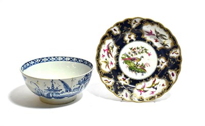 Lot 303 - A Worcester porcelain plate decorated with exotic birds and an 18th century bowl decorated in...