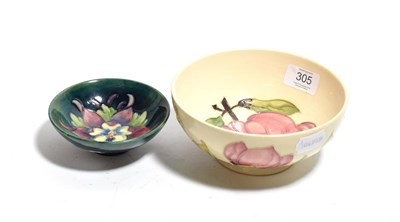 Lot 305 - A modern Moorcroft magnolia pattern bowl, 16cm diameter; and another (2)