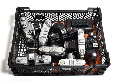 Lot 321 - Various Cameras including Canon AT1 with 50mm lens, Canon FTB and 50mm lens, two Voightlanders,...