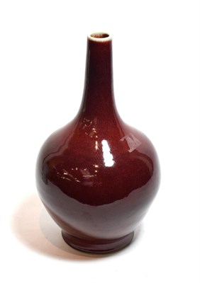 Lot 329 - A Chinese sang de boeuf bottle vase, 36cm high