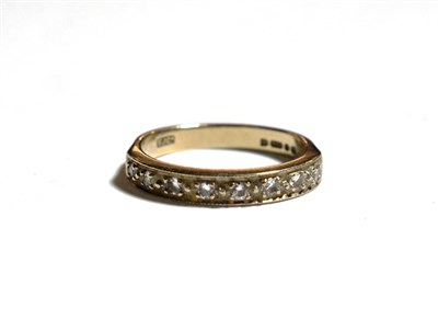 Lot 355 - An 18 carat gold diamond half hoop ring, finger size P