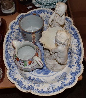 Lot 365 - A 19th century Parian centrepiece decorated with putti, a Spode mug of similar date, a...