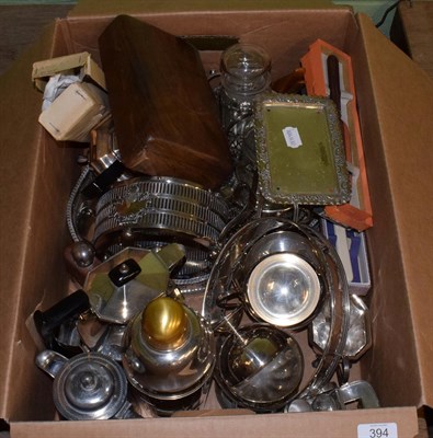 Lot 394 - A box of assorted silver-plate including a tea service, a cocktail shaker and other items, together