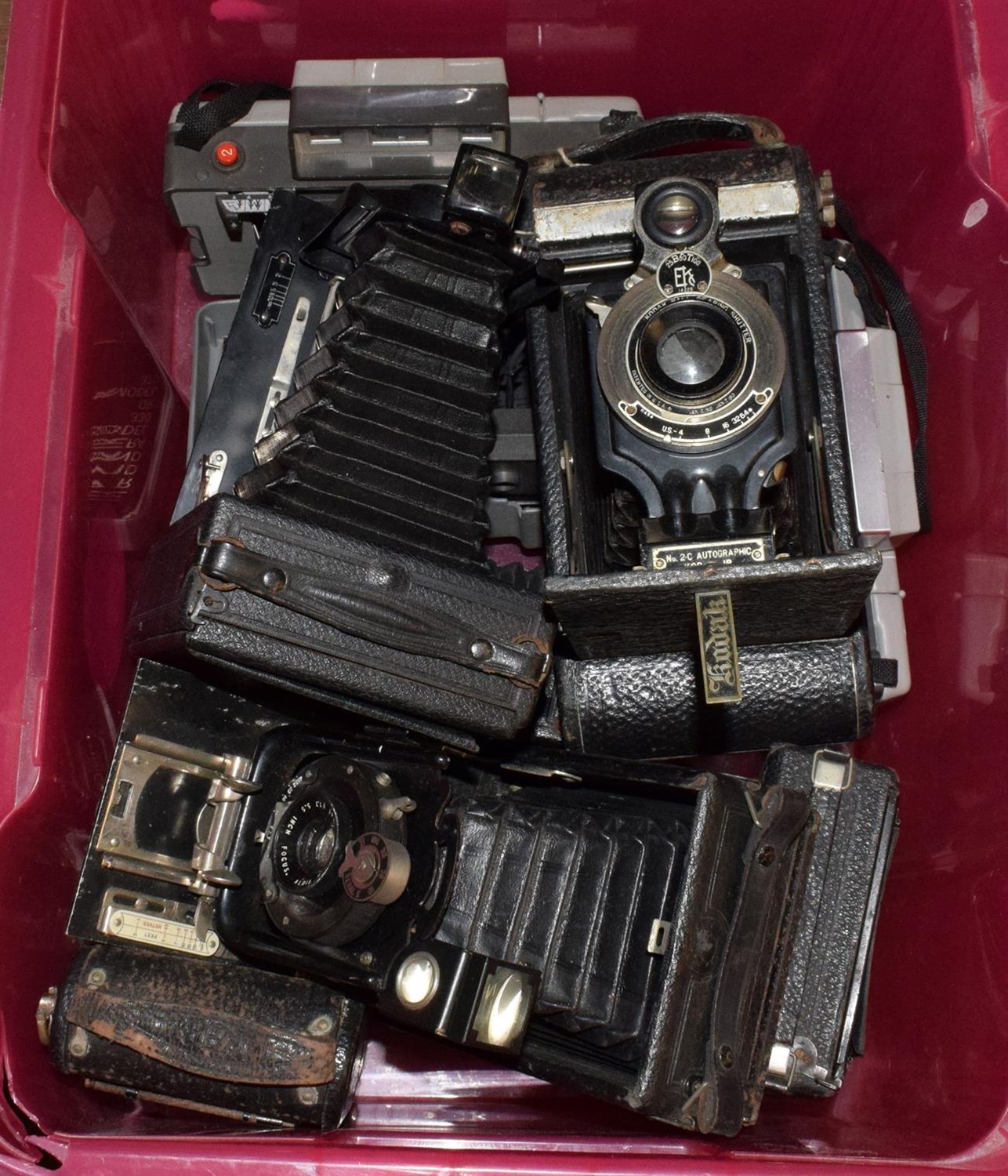 Lot 398 - Various cameras: six vintage folding examples