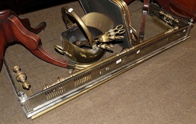 Lot 408 - A collection of fire furniture including two folding fire guards; a brass fender; a steel fender; a