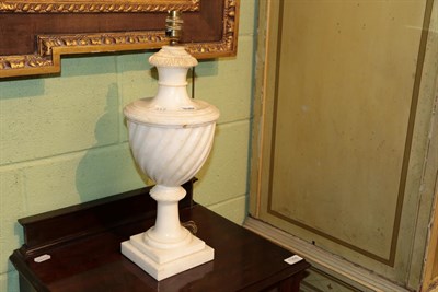 Lot 417 - An alabaster table lamp in the form of an urn