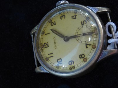 Lot 420 - A military wristwatch, signed Grana, screw back engraved 6e/385, ''Broad Arrow'', a2029