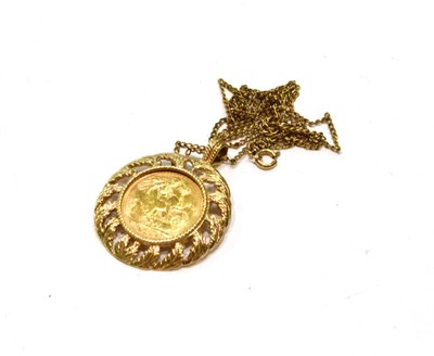 Lot 433 - A 1908 sovereign loose mounted as a pendant on chain, chain length 66cm