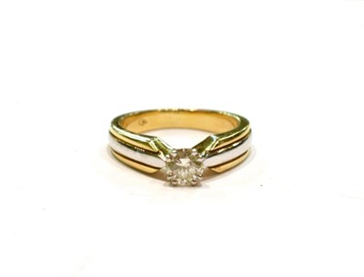 Lot 436 - A diamond solitaire ring, stamped '750', finger size N1/2