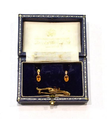 Lot 444 - A pair of gem set earrings, stamped '375'; and a 9 carat gold garnet brooch, length 3.3cm, in a...