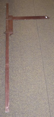 Lot 452 - A brown stained wood horse measuring stick with lead plumb bob