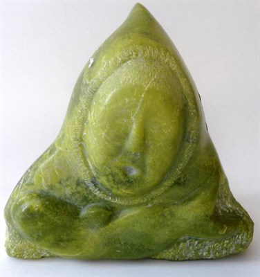 Lot 970 - An Inuit Carved Jade Bust of a Man, 20th century, wearing a hood, the base carved with a seal,...