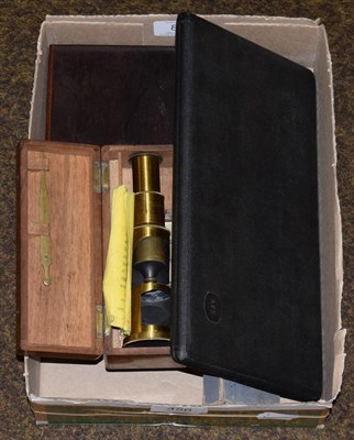 Lot 456 - Brass travelling microscope with a few prepared slides (cased) together with two drawing sets and a