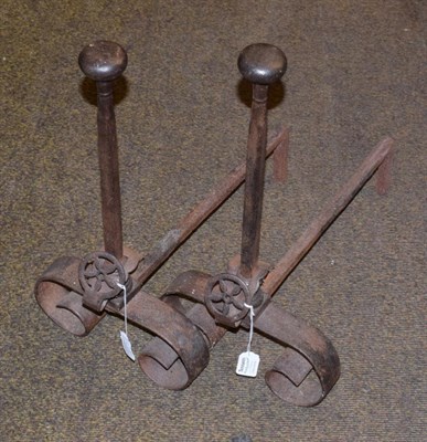 Lot 457 - A pair of andirons, 18th century, with ovoid knops and scroll feet, 53cm high