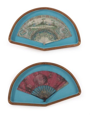 Lot 1111 - Two attractive cased 18th century fans of a similar size, the first leaf mounted on ivory and...