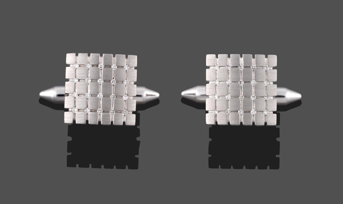 Lot 2003 - A Pair of 9 Carat White Gold Diamond Cufflinks, the square head with a hatched effect and each...