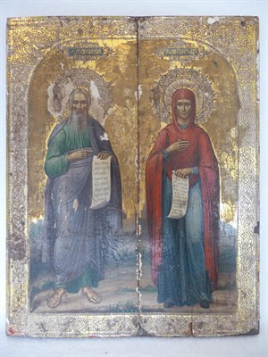 Lot 972 - A Russian Icon, probably 19th century, depicting a saint and the Virgin Mary, each holding a...