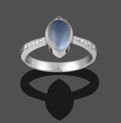 Lot 2018 - An 18 Carat White Gold Moonstone and Diamond Ring, the cabochon marquise shaped moonstone in a...