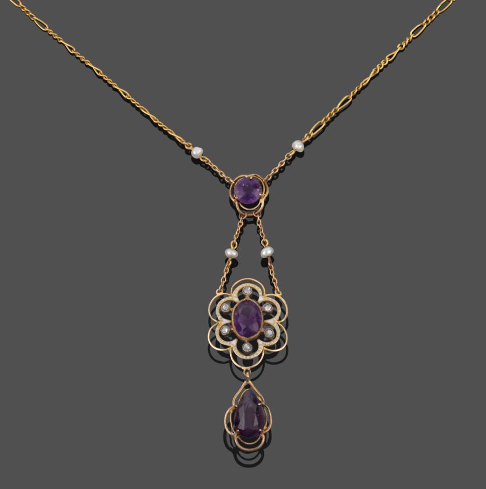 Lot 2044 - An Early 20th Century Amethyst, Diamond, Seed Pearl and Enamel Pendant Necklace, a round cut...
