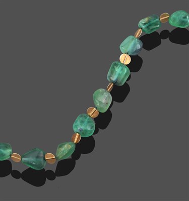 Lot 2045 - A Green Tourmaline Necklace, by Charmian Ottaway, irregular shaped green tourmaline beads spaced by