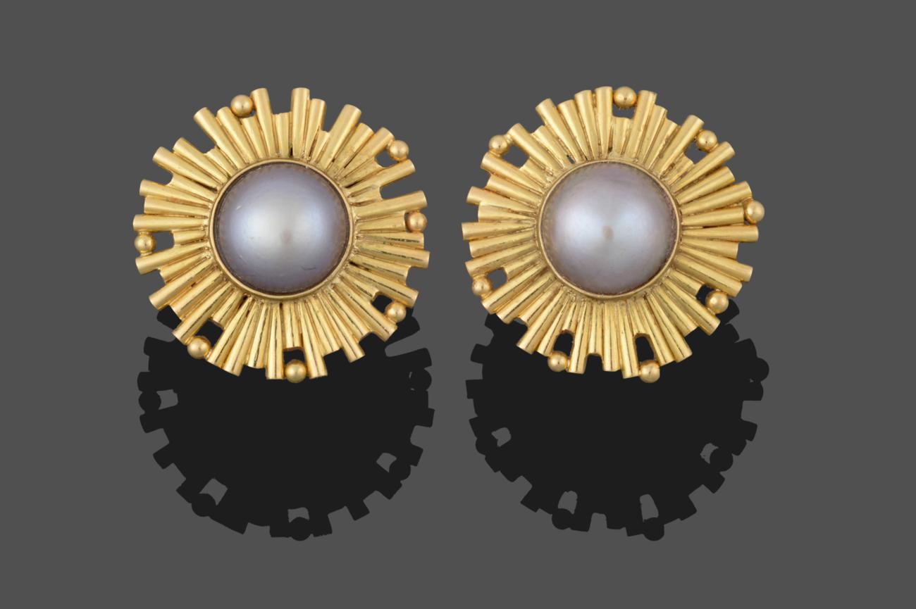 Lot 2047 - A Pair of 18 Carat Gold Mabe Pearl Earrings, the mabe pearls in yellow rubbed over settings to...