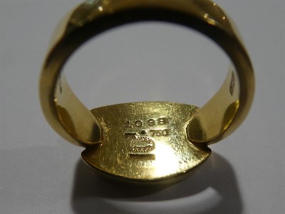 Lot 2050 - An 18 Carat Gold Ring, by Georg Jensen, of two concave lozenge forms on a pointed shoulder...