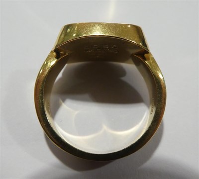 Lot 2050 - An 18 Carat Gold Ring, by Georg Jensen, of two concave lozenge forms on a pointed shoulder...