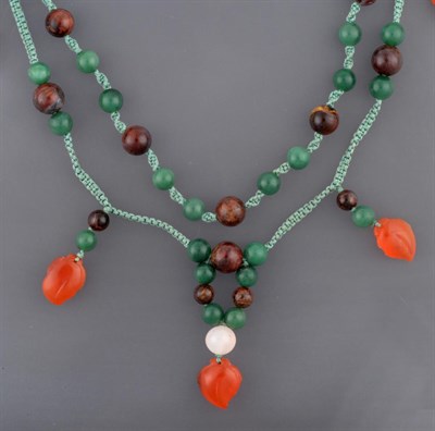 Lot 2055 - An Agate, Aventurine Quartz and Carnelian Necklace, pairs of aventurine quartz beads spaced by...