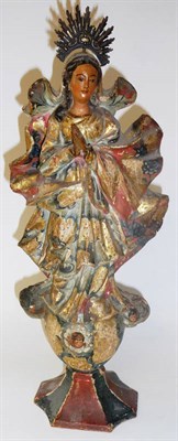 Lot 976 - A Polychrome Carved Wood Figure of the Madonna, probably Brazilian, 19th century, with stamped...