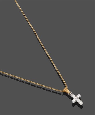 Lot 2085 - An 18 Carat Gold Diamond Cross Pendant on Chain, the pendant comprised of six round brilliant...