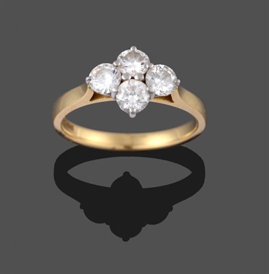 Lot 2098 - An 18 Carat Gold Diamond Four Stone Cluster Ring, four round brilliant cut diamonds in white...