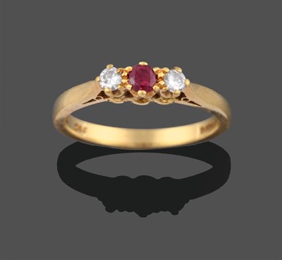 Lot 2106 - An 18 Carat Gold Ruby and Diamond Three Stone Ring, by Cropp & Farr, the central round...