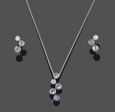 Lot 2121 - An 18 Carat White Gold Aquamarine and Diamond Earring and Pendant on Chain Set, the earrings...